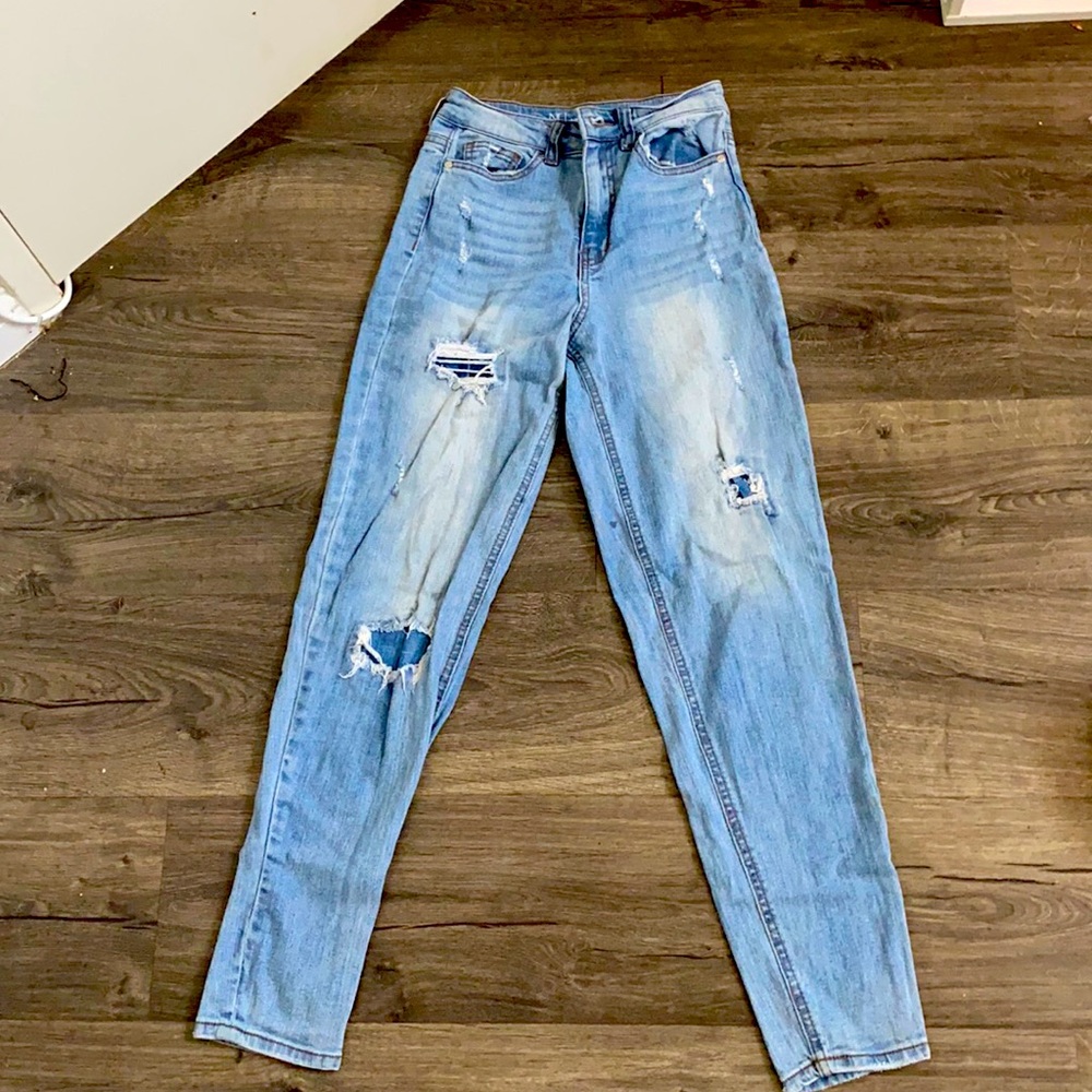 Light blue ripped jeans